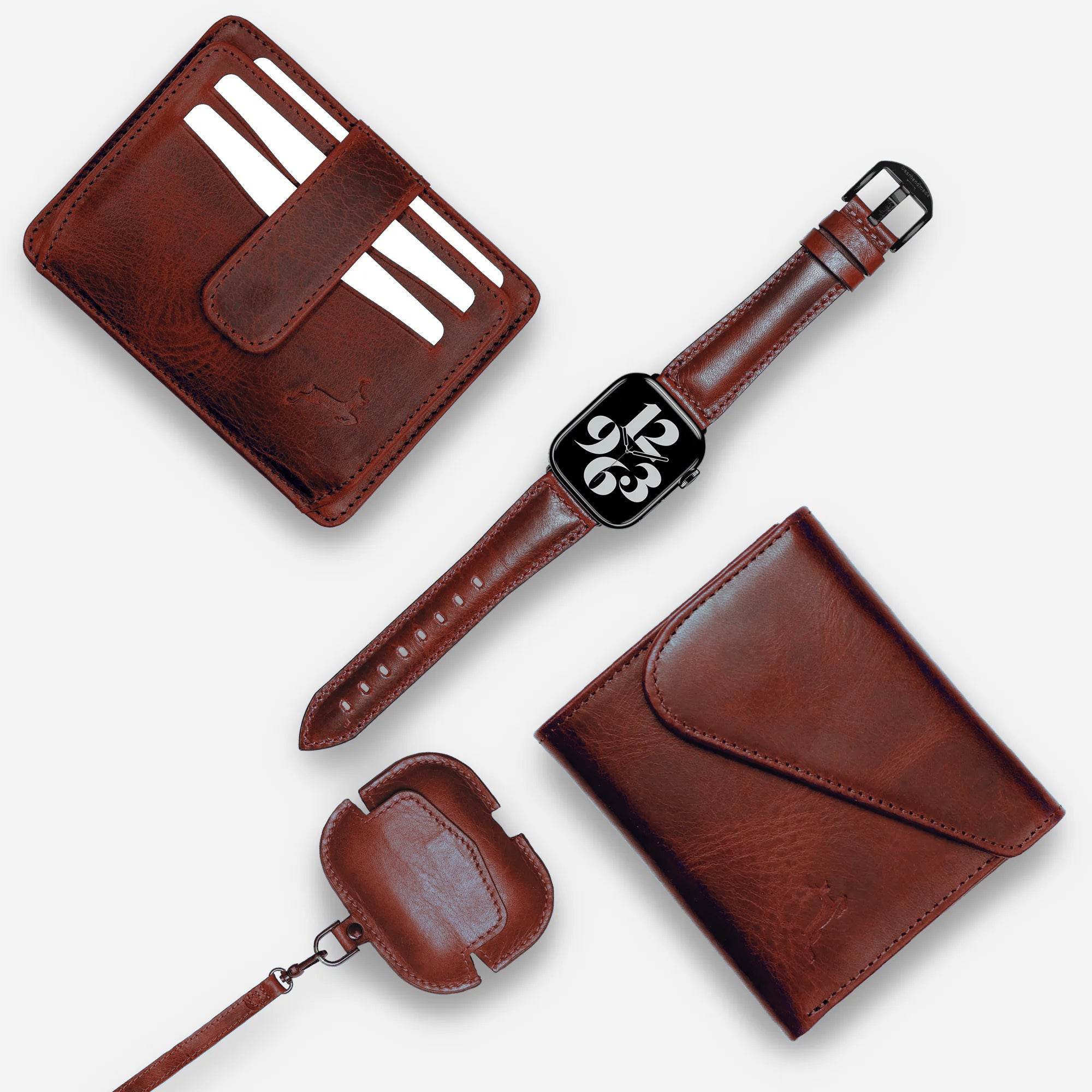 Garnet color handmade leather bifold wallet, card holder, AirPods case, and Apple Watch with leather straps displayed together in a single image.